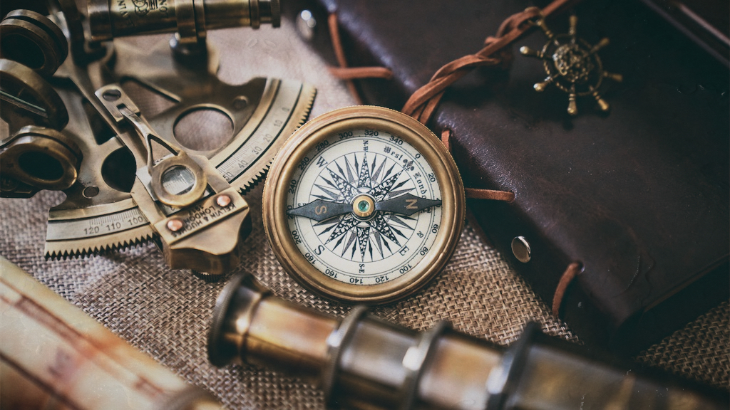 a compass and navigation tools